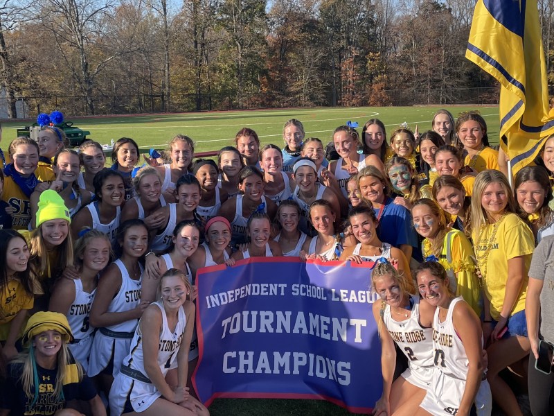 Stone Ridge field hockey team celebrates their ISL tournament championship with their fans. Credit: Stone Ridge Athletic Director Andrew Maguire. 