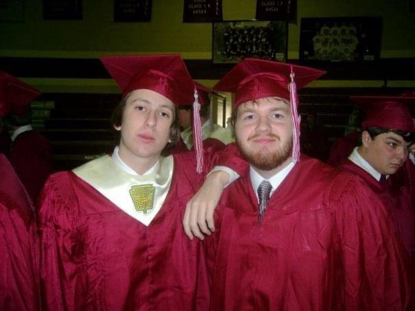 two young men in graduation robes